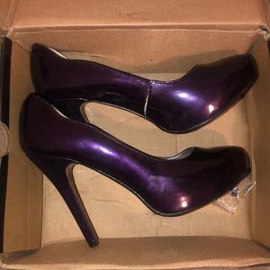Purple heels with heel tip replacements